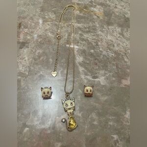 Betsey Johnson White Cat necklace and earrings set featuring gold-toned chains